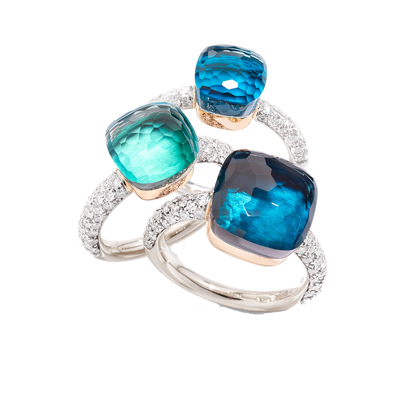 Nudo rings in white gold with diamonds and topaz by Pomellato